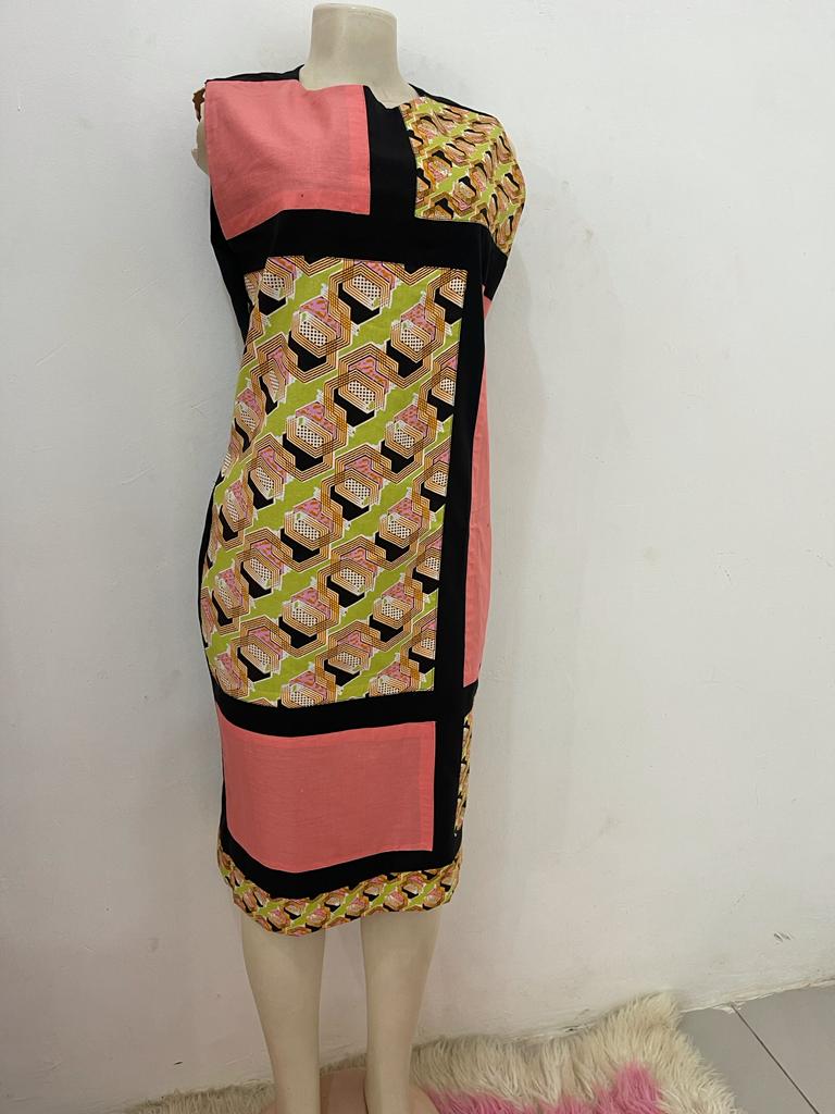 a051cebd-7d7e-474d-88ea-c2d9dd838488 Plain And Patterned Wooden African Dress - Image 1